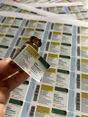 Test E 10 ml opakowania na fiolkach z etykietami na opakowaniach